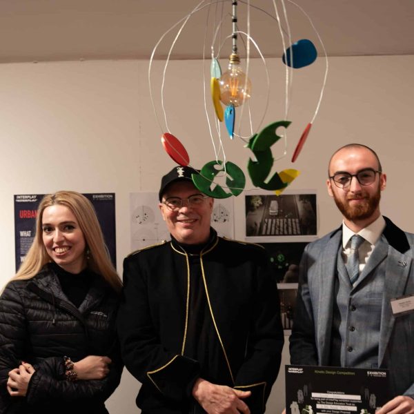 An £8K AWARD to Holly Newman & Joe Jones (right) for URBAN ELEGANCE project. Alec Robertson, DET Interplay Director (centre)